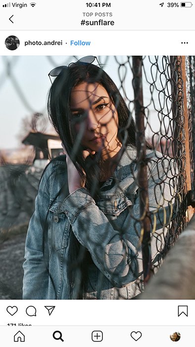 Una captura de pantalla de un teléfono inteligente de un retrato de una modelo femenina en el feed de Instagram: cómo tomar buenas fotos de Instagram