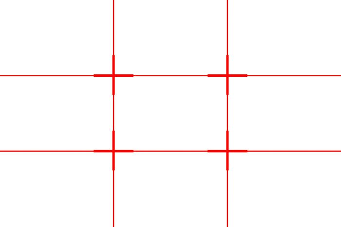 Una cuadrícula roja que muestra la cuadrícula de la regla de los tercios (dos líneas horizontales y dos líneas verticales)