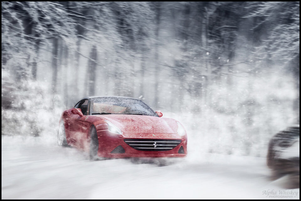 Coche Ferrari en la nieve
