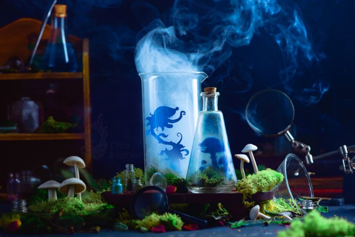 Una naturaleza muerta creativa que presenta un espeluznante experimento científico con humo y siluetas.