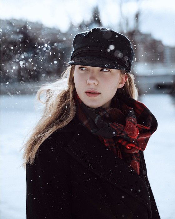 stock photo retrato de mujer con nieve cayendo